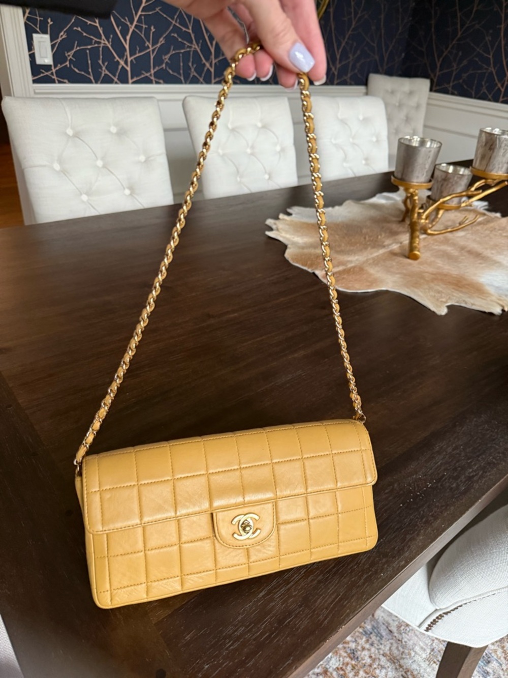 Authentic Chanel Lambskin East/West shoulder bag on Chain - great condition.